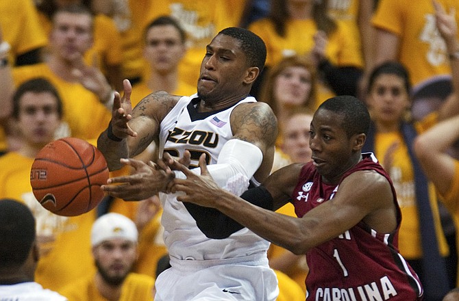 Earnest Ross of Missouri battles South Carolina's Brenton Williams for a rebound during the second half of Tuesday night's game at Mizzou Arena.