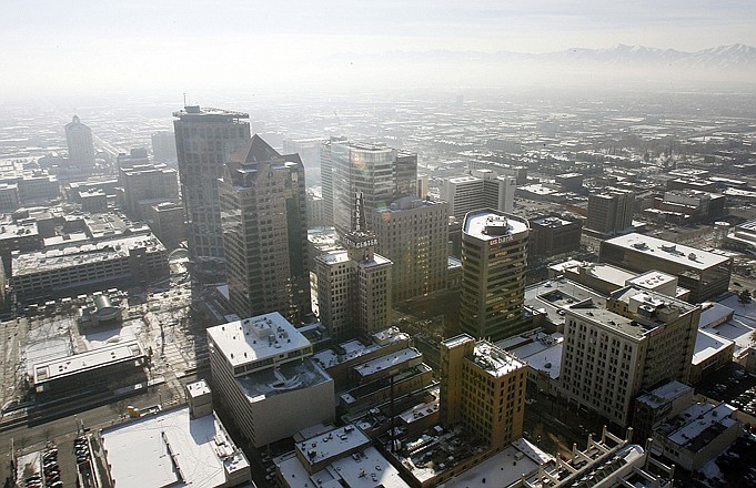 An inversion cloud covers downtown Salt Lake City on Jan. 9. A group of Utah doctors is declaring a health emergency over the Salt Lake City area's lingering air pollution problem. 