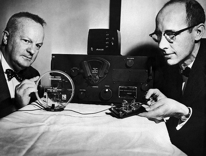 W.E. Kelley, left, and Robert C. Miller exhibit the nuclear battery, in center of ring at left, powering a radio transmitter. The tiny atomic battery, whose basic material is a radioactive waste byproduct of nuclear reactors, promethium 147, was put on display in New York for the first time. It's been nearly a quarter of a century since the last big jump in battery technology. As 21st century technology strains to be ever faster, cleaner and cheaper, the battery, an invention from more than 200 years ago keeps holding it back. 