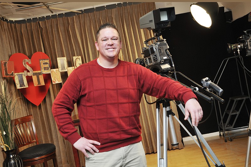 Randy Dignan, pastor of Bible Baptist Church, is shown on set at television station KNLJ in Jefferson CIty. Dignan is host of the show, The Listening Heart, which was recently picked up nationally by the Christian Television Network.