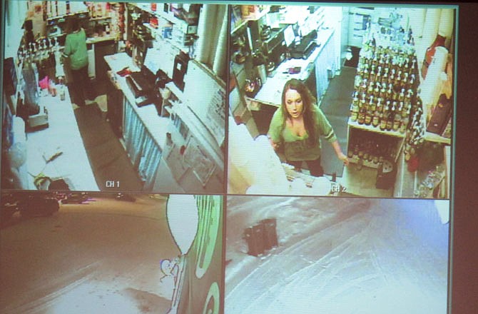 This image taken Dec. 4, 2012, in Anchorage, Alaska, shows video surveillance footage of Samantha Koenig, 18, making a cup of Americano coffee for Israel Keyes, shortly before he abducted her Feb. 1, 2012, and then killed her. Keyes showed no remorse as he detailed how he'd abducted and killed the 18-year-old woman, then demanded ransom, pretending she was alive. 