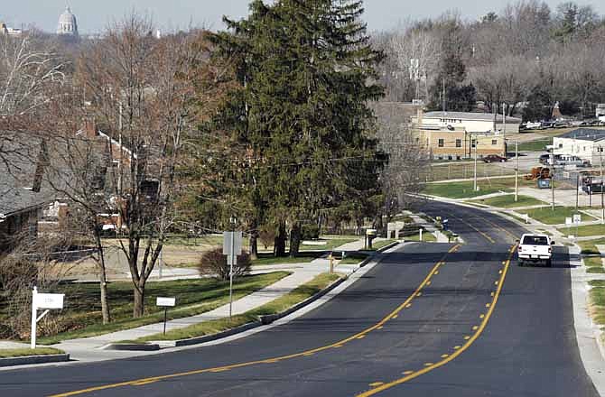 After months of construction, the East McCarty Street project left extra room for trucks to pull out and a middle turn lane -- improvements that made the road safer for drivers -- plus new sidewalks for pedestrians.