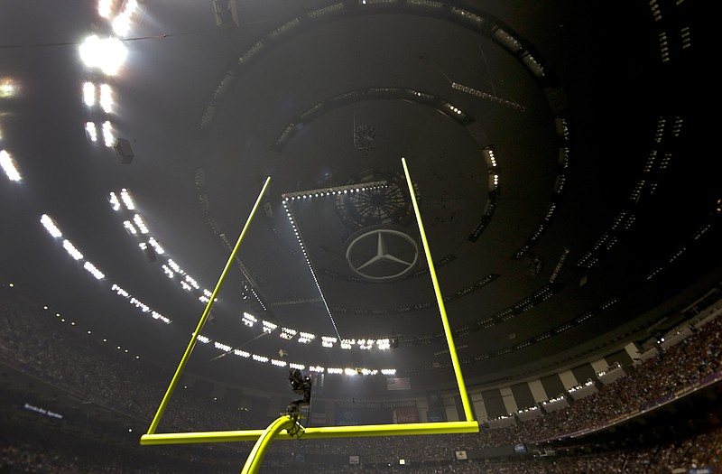 A power outage affects about half the lights in the Superdome early in the third quarter of Sunday night's Super Bowl in New Orleans. NFL commissioner Roger Goodell said the league will not hesitate to return to New Orleans.