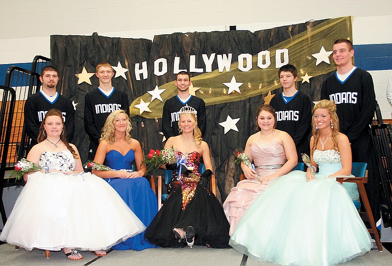 The 2013 Russellville High School Homecoming was held Friday in the high school gym, where the varsity and JV Indians defeated the Tuscumbia Lions, and Hannah Campbell was crowned Homecoming Queen. Other members of the court, from left, are candidate Emily Wilkes, with escort Kaleb Libbert (standing behind); Kennedy Volkart, with escort Levi Anderson; Campbell, with escort Dakota Burgess; Lee Kramp, with escort Ryland Johnson; and Kimberly Hobbs, with escort Chandler Wolf.  
