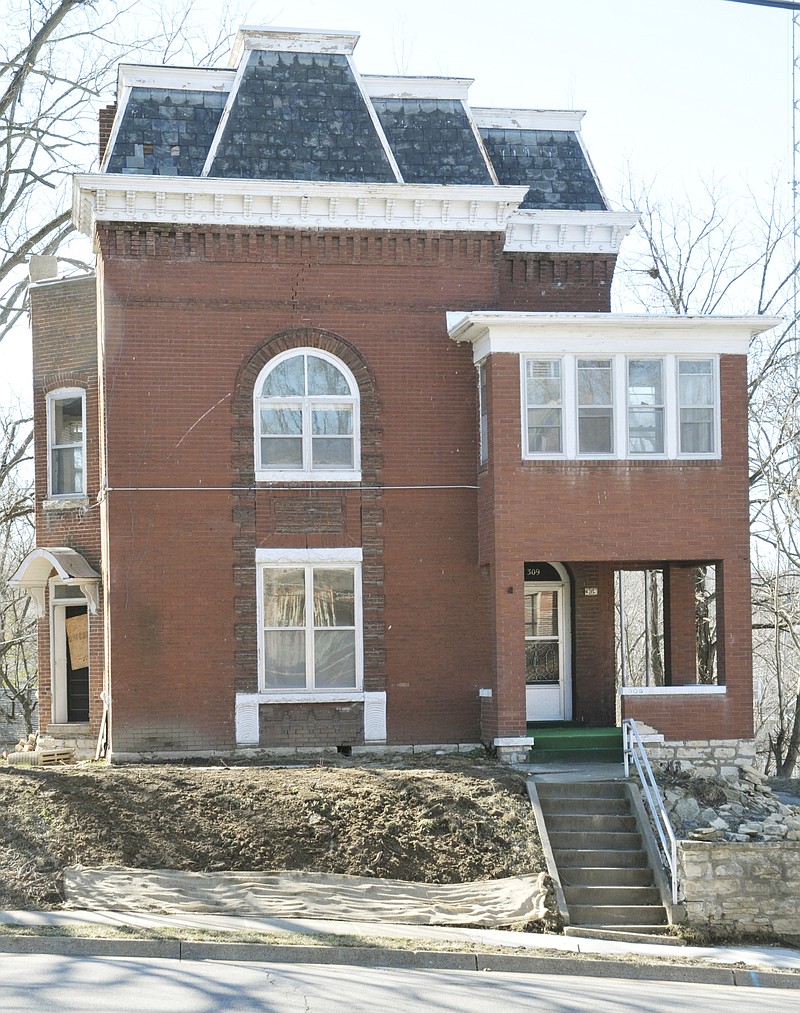 The Henry and Elizabeth Bockrath House at 309 W. Dunklin will be turned into three apartments, while retaining its original features. The 1929 building is being considered for the National Register of Historic Places. 