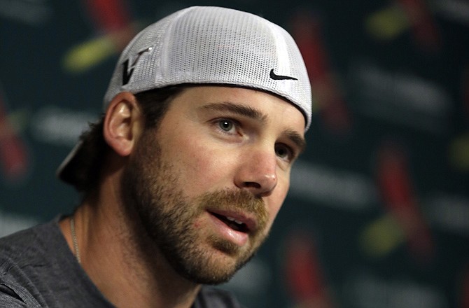 Cardinals pitcher Chris Carpenter speaks about his future during a press conference Monday at Busch Stadium.