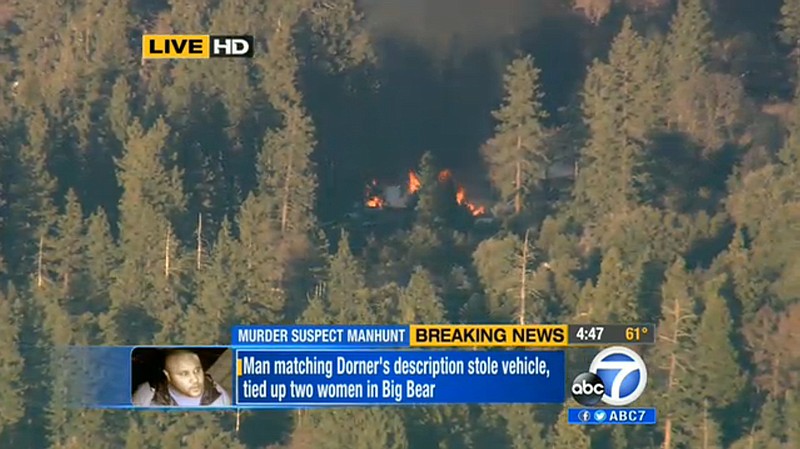 In this image taken from video provided by KABC-TV, the cabin in Big Bear, Calif. where ex-Los Angeles police officer Christopher Dorner was believed to be barricaded inside.