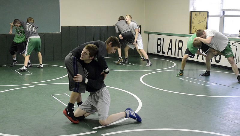 The eight Blair Oaks state tournament qualifiers go through drills during practice earlier this week in Wardsville.