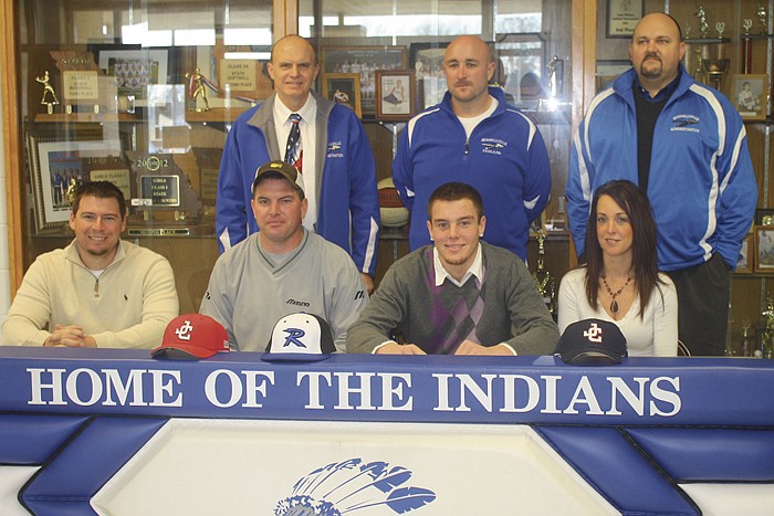 Cole County R-1 Schools Senior Chandler Wolf recently signed a commitment to play baseball while attending Jefferson College this fall. Showing support for Wolf included, front row from left, Patrick Evers, Jefferson College assistant coach and pitching coach; Craig Wolf; Chandler Wolf and Katie Richey. Others in attendance were Jerry Hobbs, Russellville High School Superintendent; Lucas Branson, Russellville head baseball coach; and Heath Waters, Russellville High School principal and athletic director. Submitted photo