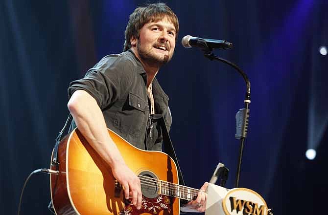 In this March 18, 2011 file photo, country singer Eric Church performs at the Grand Ole Opry in Nashville, Tenn. Church is the top nominee with seven nominations at the upcoming 48th annual Academy of Country Music Awards. The show will broadcast live on CBS from the MGM Grand Garden Arena in Las Vegas on Sunday, April, 8, 2013.
