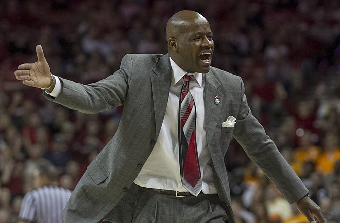 Arkansas head coach Mike Anderson disputes a call during the second half an a game earlier this month against Tennessee. Arkansas hosts Missouri today in Anderson's first game against his former team.