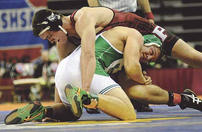 Eli Roberts of Blair Oaks (bottom) takes on Dylan McClain of Plattsburg in the Class 1 182-pound championship match Saturday at Mizzou Arena. Roberts won 6-4 to capture the state title. 