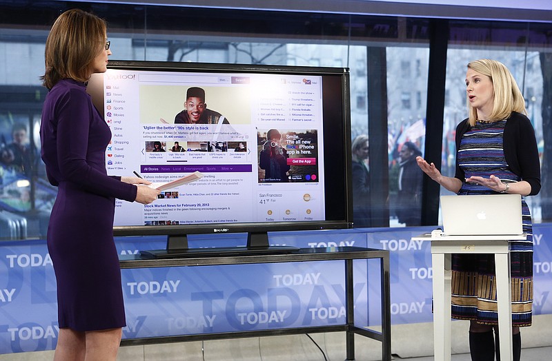 This image released by NBC shows host Savannah Guthrie, left, on Wednesday with Yahoo CEO Marissa Mayer on NBC News' "Today" in New York as Mayer introduces the website's redesign. Yahoo is renovating the main entry into its website in an effort to get people to visit more frequently and linger for longer periods of time.