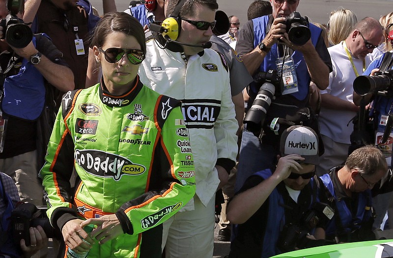 Danica Patrick walks to her car prior to the first Budweiser Duel on Thursday at Daytona International Speedway.