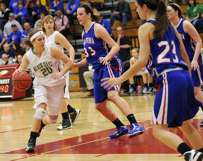 Lee Ann Polowy of Blair Oaks tries to find her way through the California defense during Sunday afternoon's Class 3 District 8 Tournament title game in Ashland.