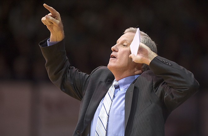 Saint Louis Billikens' head coach Jim Crews directs his players during Friday's game against Butler.