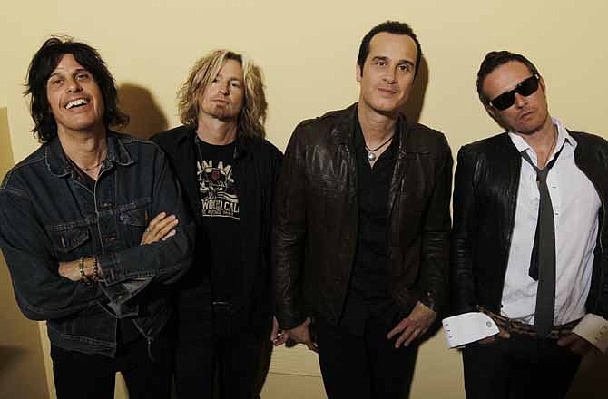 This April 30, 2010 file photo shows the Stone Temple Pilots, from left, Dean Deleo, Eric Kretz, Robert Deleo, and Scott Weiland posing for a portrait in Santa Monica, Calif. In a one-sentence news release on Feb. 27, 2013, publicist Kymm Britton said: "Stone Temple Pilots have announced they have officially terminated Scott Weiland." No other information was provided. 