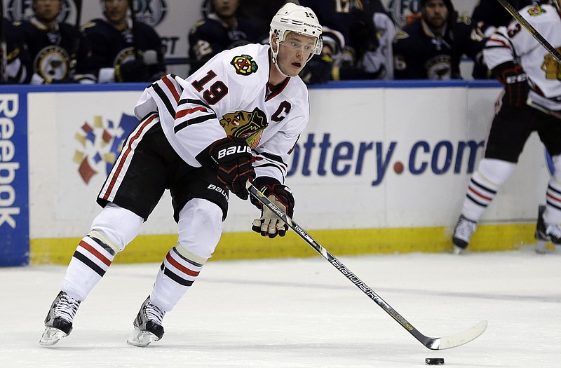 Jonathan Toews looks up the ice during his two-goal game against the Blues on Thursday in St. Louis.