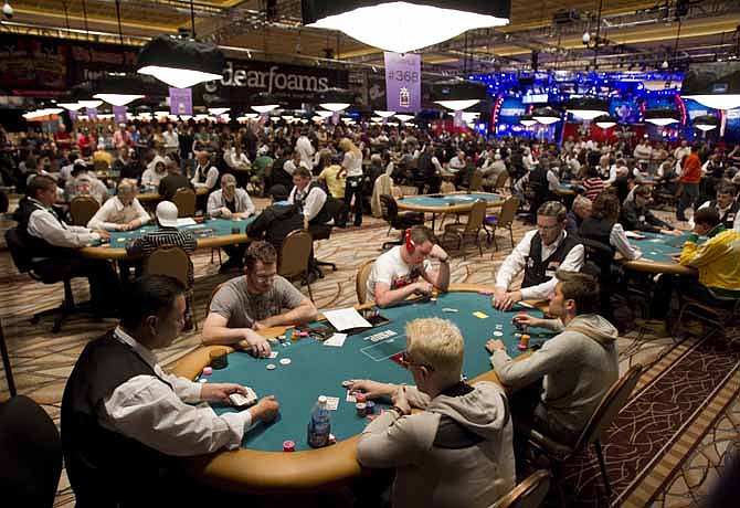 Players compete in a Heads-Up poker tournament during the World Series of Poker at the Rio hotel and casino in Las Vegas. At the height of the poker fad, Las Vegas couldn't get enough of poker rooms. Now some of those rooms are folding. Four casinos yanked their poker tables last year, including the Tropicana, and three other rooms closed shop in 2011.