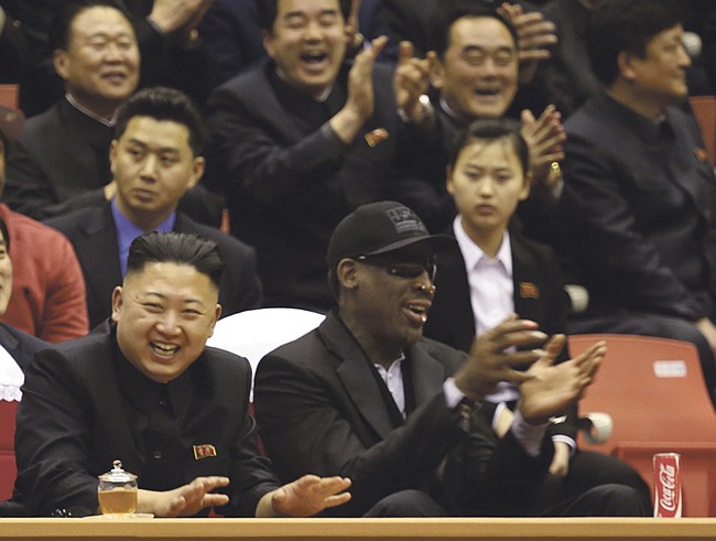North Korean leader Kim Jong Un, left, and former NBA star Dennis Rodman watch North Korean and U.S. players in an exhibition basketball game in Pyongyang on Thursday.