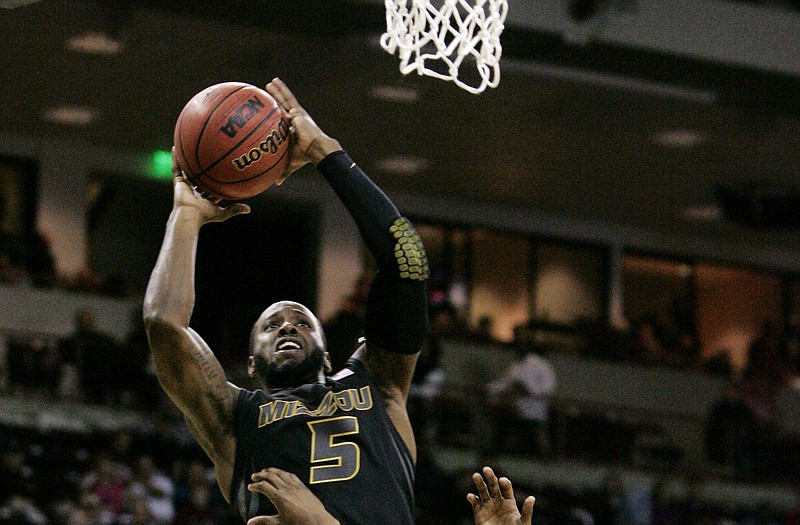 Keion Bell of Missouri goes up for two of his 24 points in Thursday night's 90-68 victory against South Carolina in Columbia, S.C.