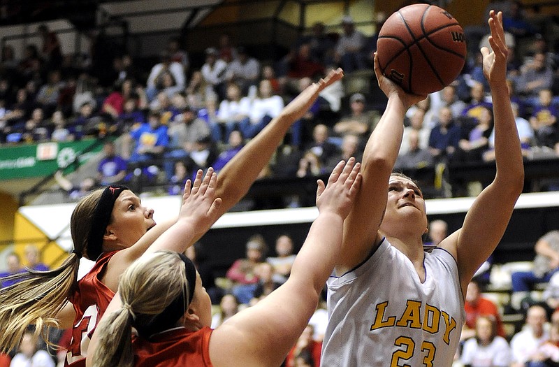 Chamois forward Miranda Brandt cuts through the Mercer defense and puts up a shot from the low post in the first half of Thursday's MSHSAA Show-Me Showdown Class 1 girls semifinal matchup at the Hearnes Center.