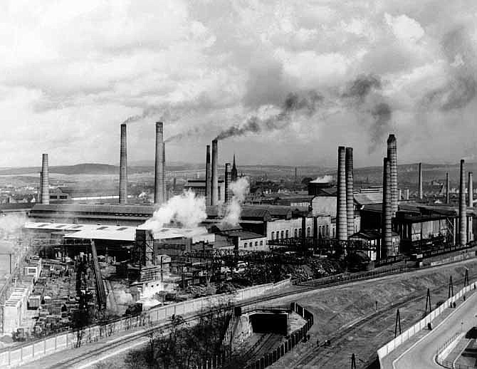 In this Aug. 29, 1938 photo, smoke rises from smokestacks at Skoda's main foundry in Pilsen, Czechoslovakia. A new study looking at 11,000 years of climate temperatures shows the world in the middle of a dramatic U-turn, lurching from near-record cooling to a heat spike.
