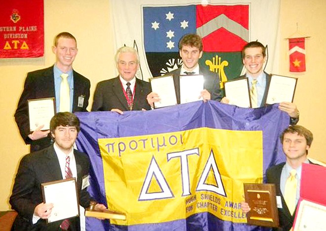 Members of the Delta Omicron Chapter of Delta Tau Delta fraternity at Westminster College in Fulton receive the Hugh Shields Award for Chapter Excellence, the international fraternity's highest honor.