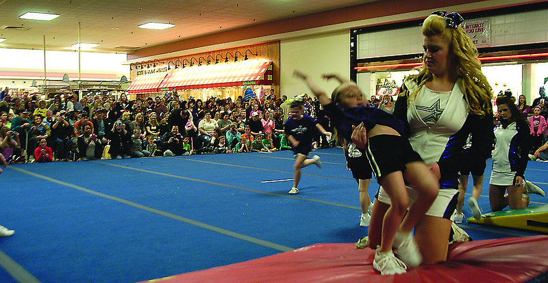 Dozens of Capital City Cheer participants performed a show at Capital Mall on Sunday for spectators. Such large community events had been rare in recent years at the mall. Capital City Cheer had hoped to get 1,000 spectators at the event.