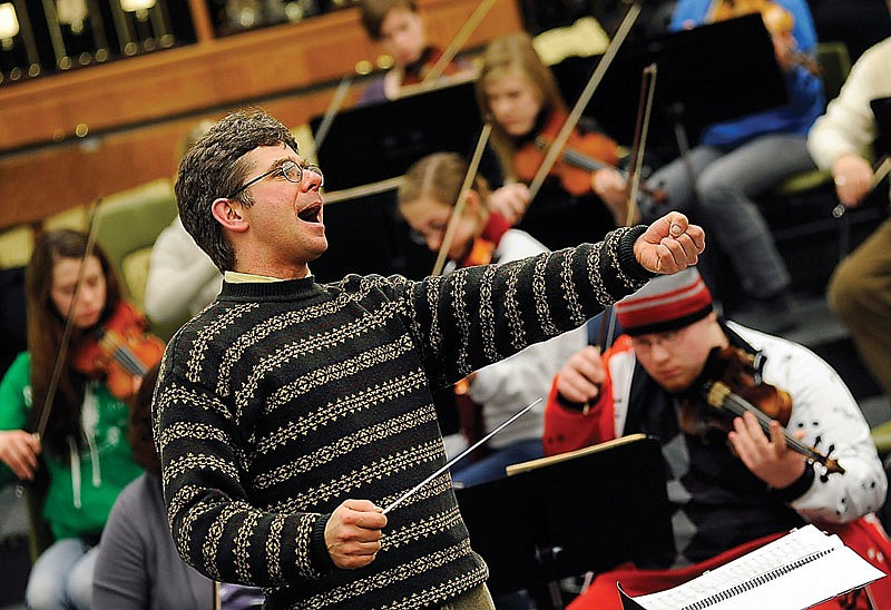 Music Director and principal conductor Patrick Clark leads the Jefferson City Symphony Orchestra during a recent rehearsal at Jefferson City High School.