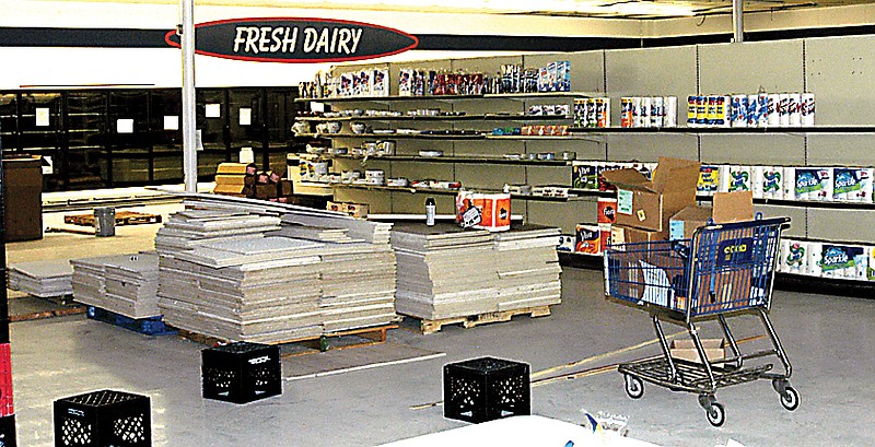 The display cases and shelves are coming together as C&R Supermarket prepares to relovate into its new home. 