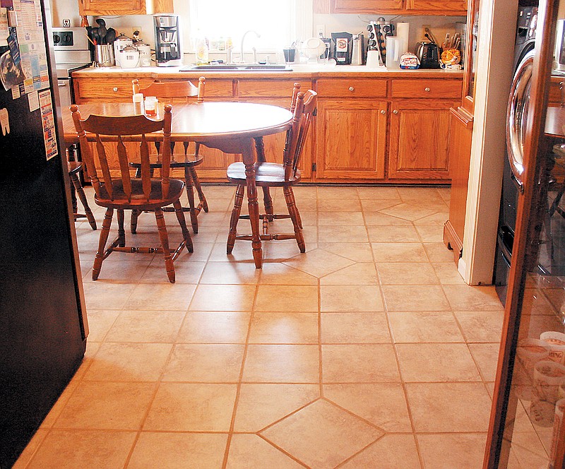 Jim and Jeanne Miller's kitchen now boasts a new tile floor installed by Brian Siebert, California.