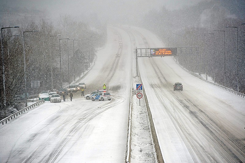 Due to a heavy snowstorms Friday, police sealed off a section of a highway in the suburbs of Budapest, Hungary. Winter weather returning to Hungary with heavy snowfall, blizzards, ice and cold has left thousands without electricity, blocked access to several localities, forced traffic halts in major services and caused several accidents across the country. 