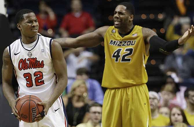 Mississippi guard Jarvis Summers (32) reacts after being fouled by Missouri forward Alex Oriakhi (42) during the first half of an NCAA college basketball game at the Southeastern Conference tournament, Friday, March 15, 2013, in Nashville, Tenn. 