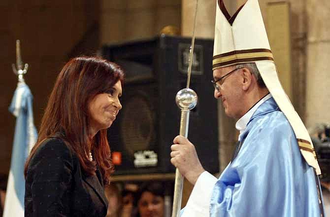 In this Dec. 12, 2008 file photo, Argentina's President Cristina Fernandez, left, shakes hands with Buenos Aires' archbishop Jorge Mario Bergoglio in Lujan, Argentina. Bergoglio, who chose the name of Francis, was chosen as the 266th pontiff of the Roman Catholic Church on March 13, 2013. Pope Francis has honed his leadership skills in one of the most difficult classrooms on the planet: Argentina, where politics has long been a blood sport practiced only by the brave. 