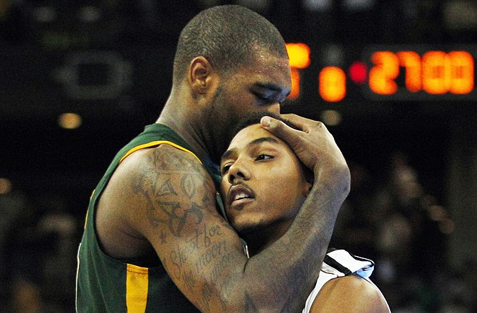 Kyle O'Quinn of Norfolk State hugs Missouri's Phil Pressey after Norfolk State's 86-84 NCAA Tournament win last year in Omaha, Neb.