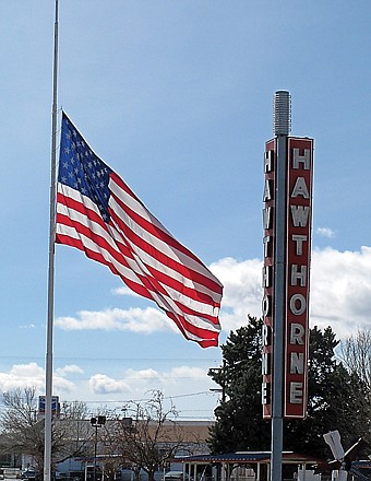 An American flag waves at half staff in the town of Hawthorne near the Hawthorne Army Depot, where seven Marines were killed and several others seriously injured in a training accident Monday night.