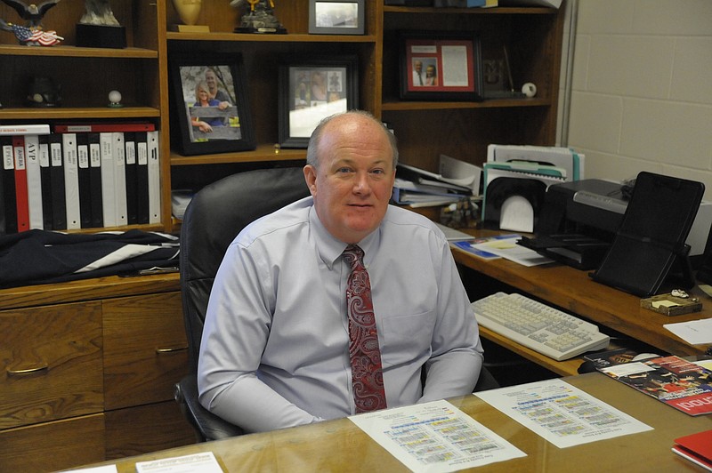 Mark Blythe sits in his Eugene school office. He will leave the superintendent's post at the end of the school year to take a job with a food service company.