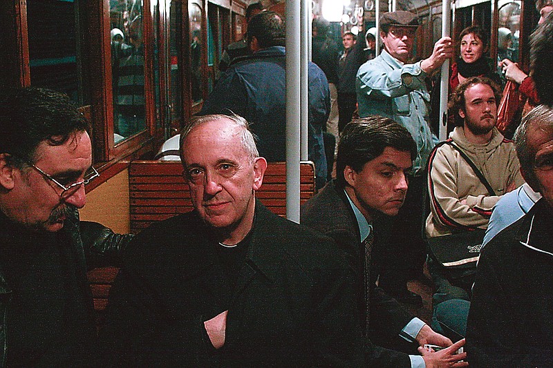 In a 2008 photo, Cardinal Jorge Mario Bergoglio, second from left, travels on the subway in Buenos Aires, Argentina.