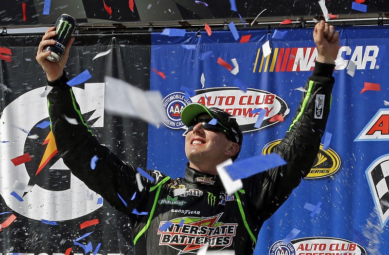 Kyle Busch celebrates his win in the Auto Club 400 on Sunday in Fontana, Calif.