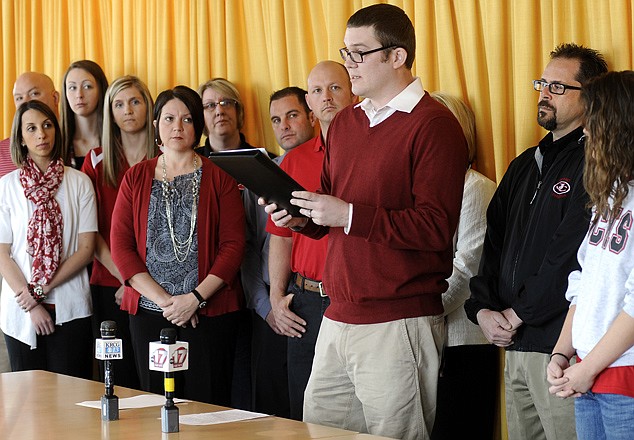 
Jefferson City High School Spanish teacher Shane Williams reads a prepared statement to members of the media on Wednesday as he and several other JCHS teachers and staff announced their support for the proposed bond and levy increases to fund a new Jefferson City High School.
