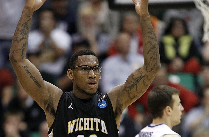 Wichita State's Carl Hall celebrates after the Shockers upset top-seeded Gonzaga last Saturday in Salt Lake City. Wichita State, a No. 9 seed, will face 13th-seeded La Salle in a Sweet Sixteen game tonight.