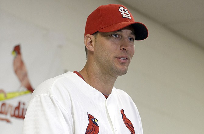 Cardinals pitcher Adam Wainwright answers questions Thursday in Jupiter, Fla.