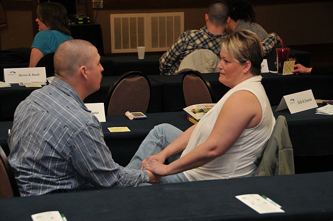 Spec. Duskey Graham, a traditional small arms repair specialist, and his wife Shana discuss the "Speaker-Listener" technique at the Strong Bonds retreat held at Tan-Tar-A Resort in Osage Beach, Mo., on March 23. "A good marriage is always learning. It changes and you have to do it together," said Spec. Graham.