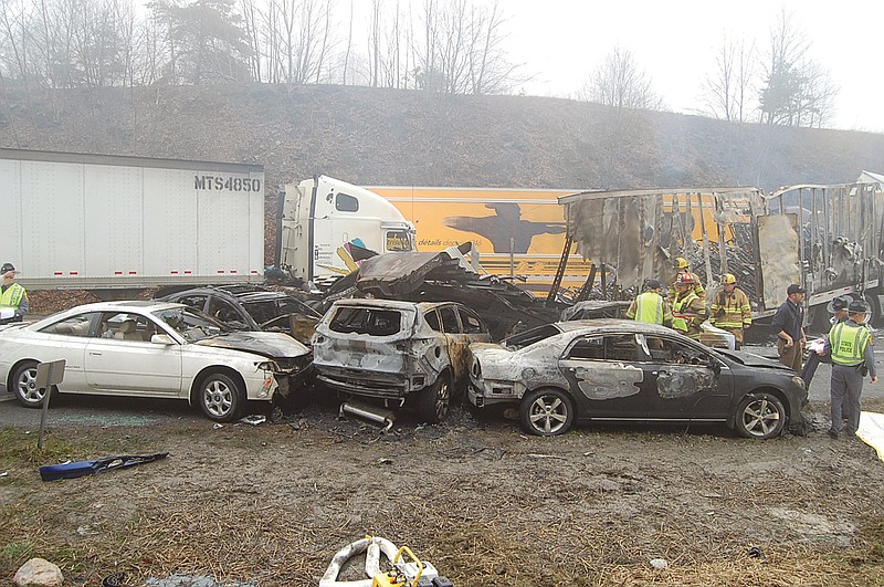 This photo provided by the Virginia State Police shows the scene following a 95-vehicle pileup on Interstate 77 near the Virginia-North Carolina border in Galax, Va., on Sunday. Virginia State Police say three people have been killed and more than 20 are injured and traffic is backed up about 8 miles.