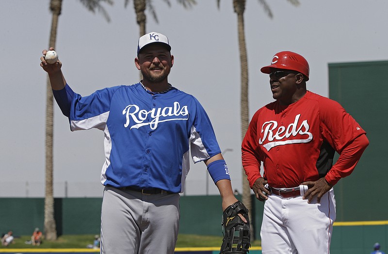 Billy Butler of the Royals, shown here talking with Reds first-base coach Billy Hatcher during a game last month in Arizona, believes his team is ready to win.