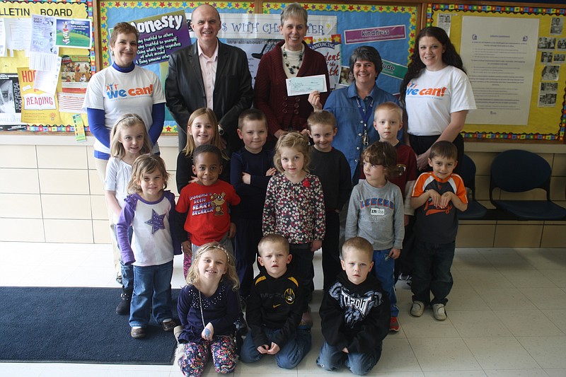 Students in the Cole County R-I Preschool class recently helped teacher Ann Brennecke accept a $500 WeCan Garden Grant from Cole County Health Department representatives Mary Telthors, left, and Teresa Wertman, right. Children pictured from the left in the front row are: Brylie Kilson, Brody Young and Beau Young; middle row: Lula George, Joe Strobel, Karleigh Grayson, Gabriel Steenbergen and Caden Farris; and back row: Matayah Steinman-Bush, Erin Broker, Xander Gipson, Colton Smith and Grant Smith. submitted photo