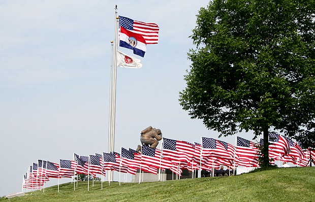 A total of 65 flags were flown at the Fire Fighters' Memorial at Kingdom City last year during Memorial Day. The flags were purchased for $35 each as a contribution to a proposed Fire Fighters Museum to be built near the memorial. Organizers of the flag sale hope to fly at least 300 flags at the memorial this year.