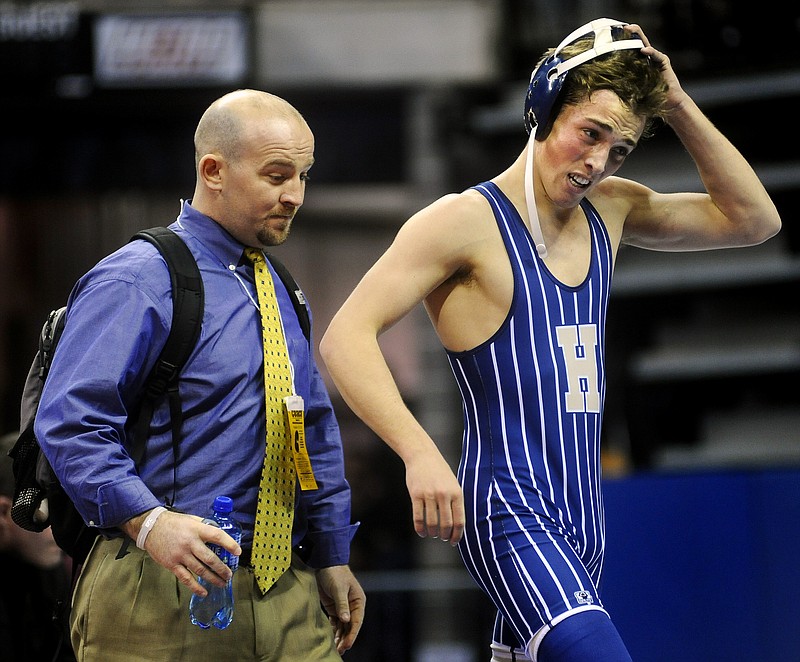 Helias wrestling coach Travis Reinsch has stepped down to take an administrative position at the school.