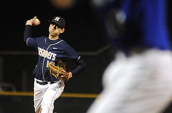 Helias pitcher Matt Rehagen works to the plate during Friday night's game against Rockhurst at Vivion Field.